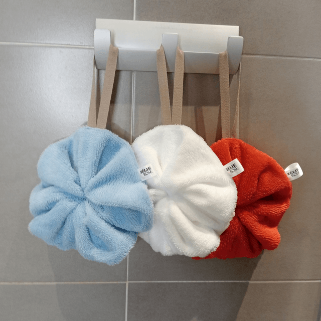 Fleur de douche lavable, réutilisable blanche